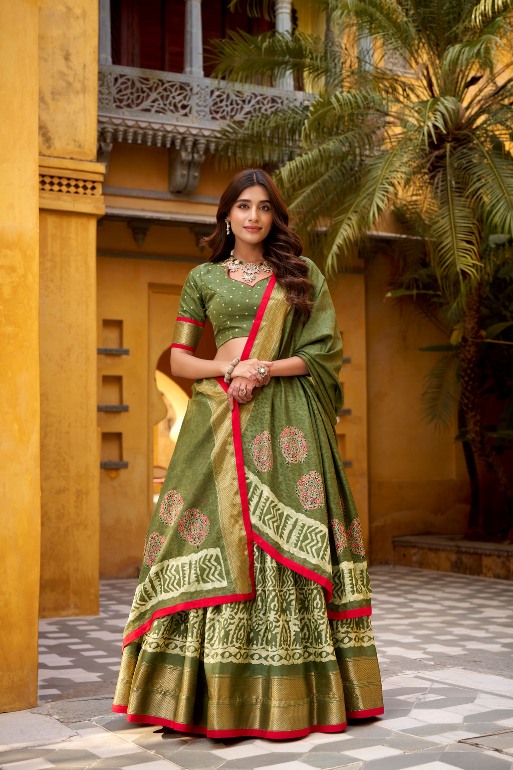 Girija Mehendi Green Dola Silk Batik Print With Zari
Weaving Work Lehenga Choli