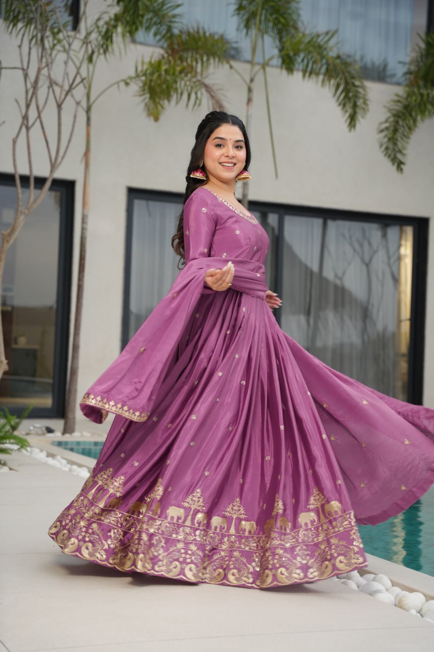 Harvisha mauve purple Chinon silk embroidered gown with full sleeves, floor-length 56-inch flair, rich sequin detailing, and matching embroidered dupatta – ideal Indian ethnic party gown for weddings, receptions, and festive occasions.