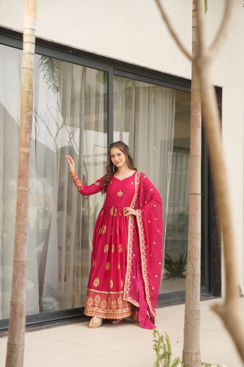 Rudrika Pink Embroidered Gown in soft Star Georgette with intricate zari and sequin work, full-length 56-inch flare gown with matching embroidered dupatta, elegant pan neck design, perfect for weddings and festive occasions