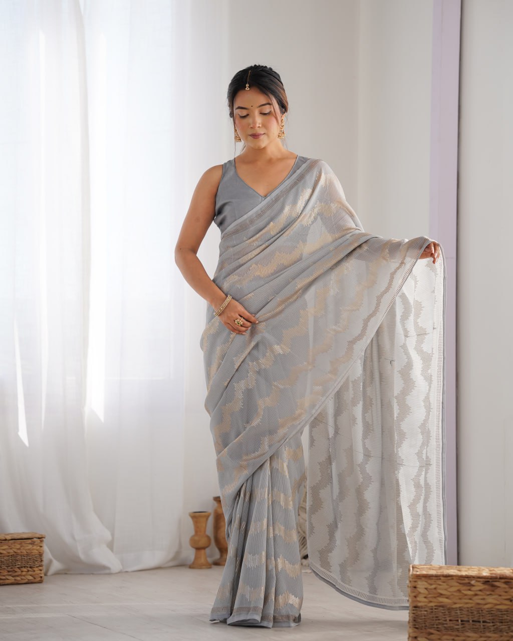 Graceful Aira Grey Georgette saree with heavy sequin embroidery and Seroski diamond embellishments, paired with an unstitched satin Banglori blouse – ideal bridal saree, festive saree, designer grey saree, elegant ethnic party wear, and luxury embroidered saree for women.