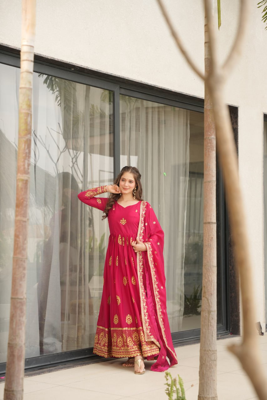 Rudrika Pink Embroidered Gown in soft Star Georgette with intricate zari and sequin work, full-length 56-inch flare gown with matching embroidered dupatta, elegant pan neck design, perfect for weddings and festive occasions