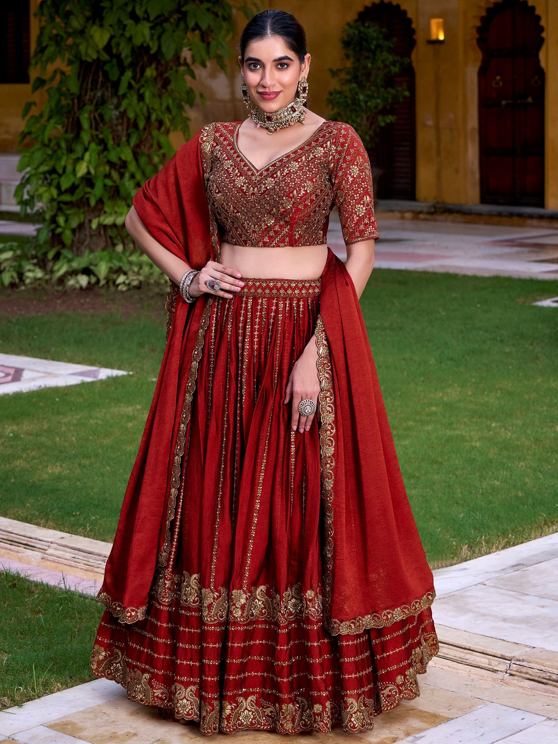 Rust orange silk sequins thread embroidery lehenga choli with dupatta