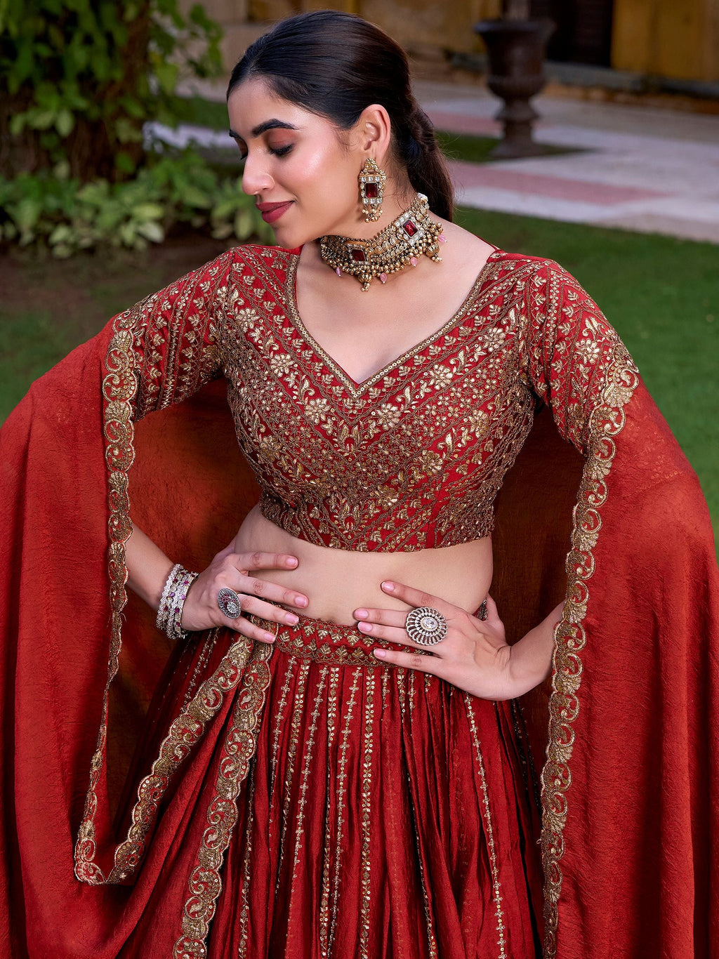 Rust orange silk sequins thread embroidery lehenga choli with dupatta