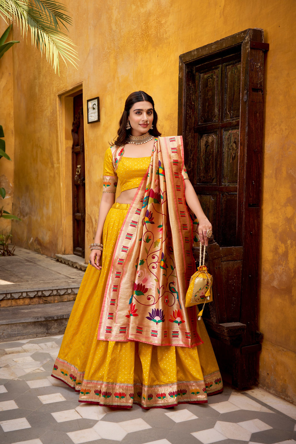 Shubhangi yellow zari weaving work silk paithani lehenga choli set