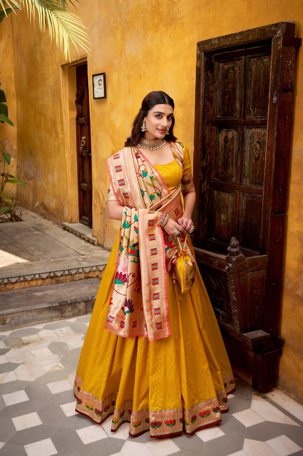 Shubhangi yellow zari weaving work silk paithani lehenga choli set