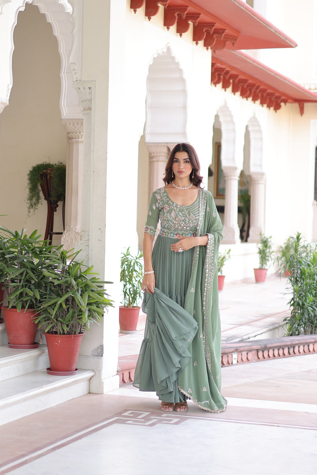 Tosi pista green faux blooming gown with sequins embroidered work and dupatta
