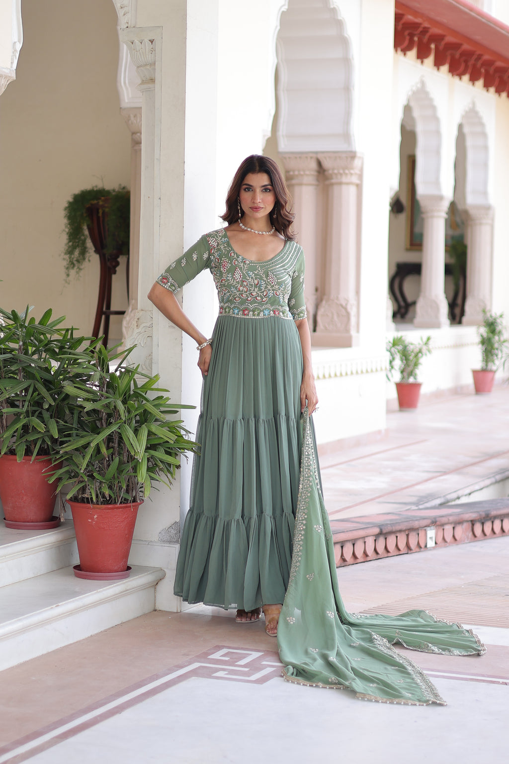 Tosi pista green faux blooming gown with sequins embroidered work and dupatta