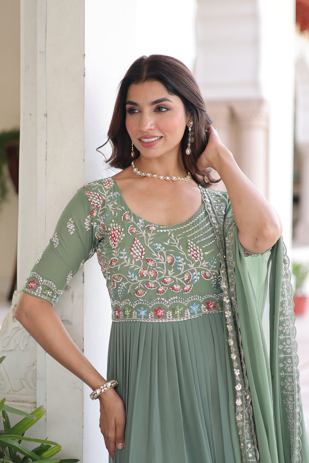 Tosi pista green faux blooming gown with sequins embroidered work and dupatta