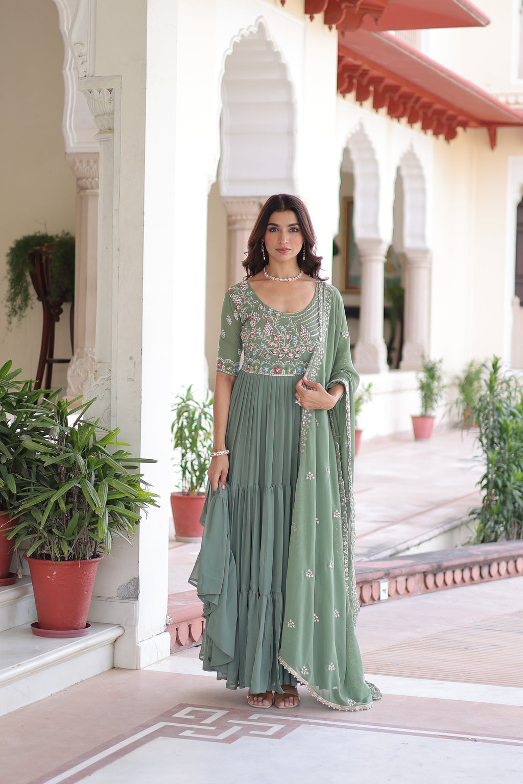 Tosi pista green faux blooming gown with sequins embroidered work and dupatta