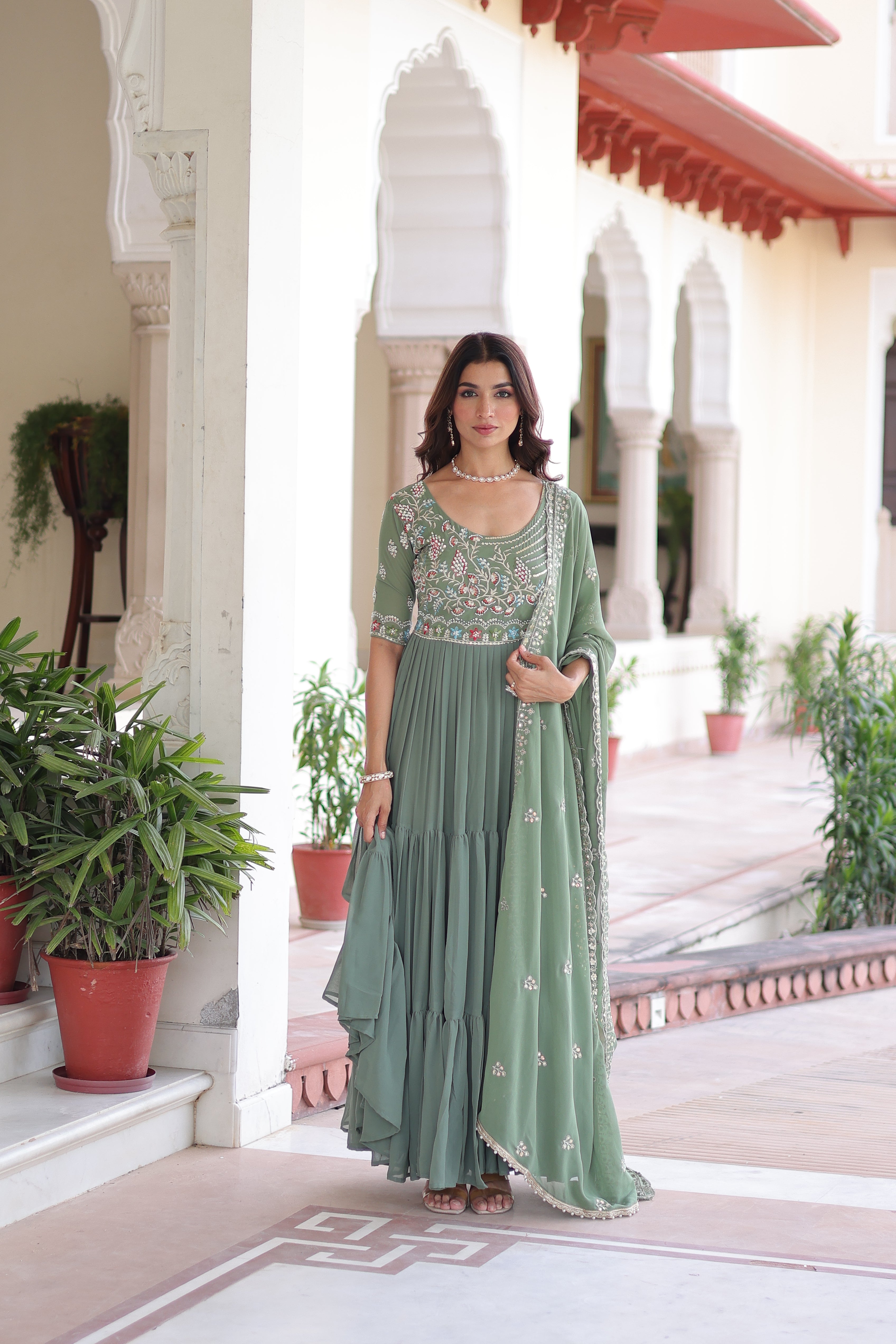 Tosi pista green faux blooming gown with sequins embroidered work and dupatta