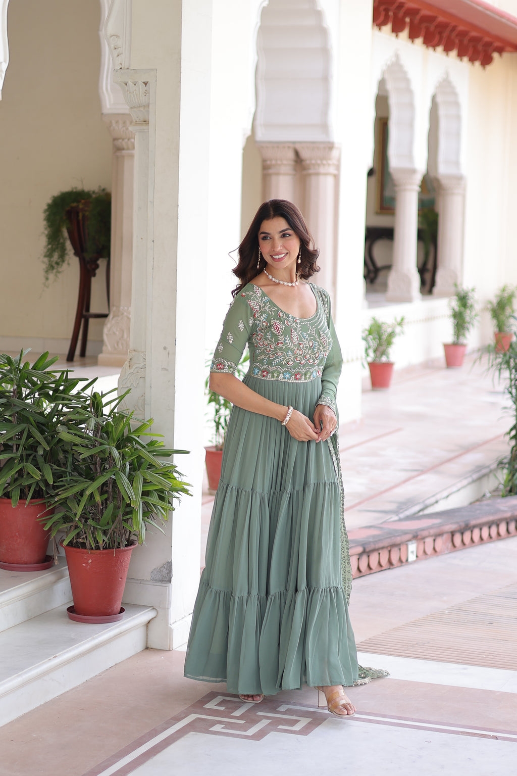 Tosi pista green faux blooming gown with sequins embroidered work and dupatta