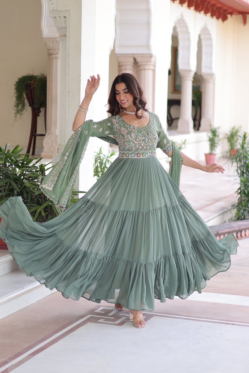 Tosi pista green faux blooming gown with sequins embroidered work and dupatta