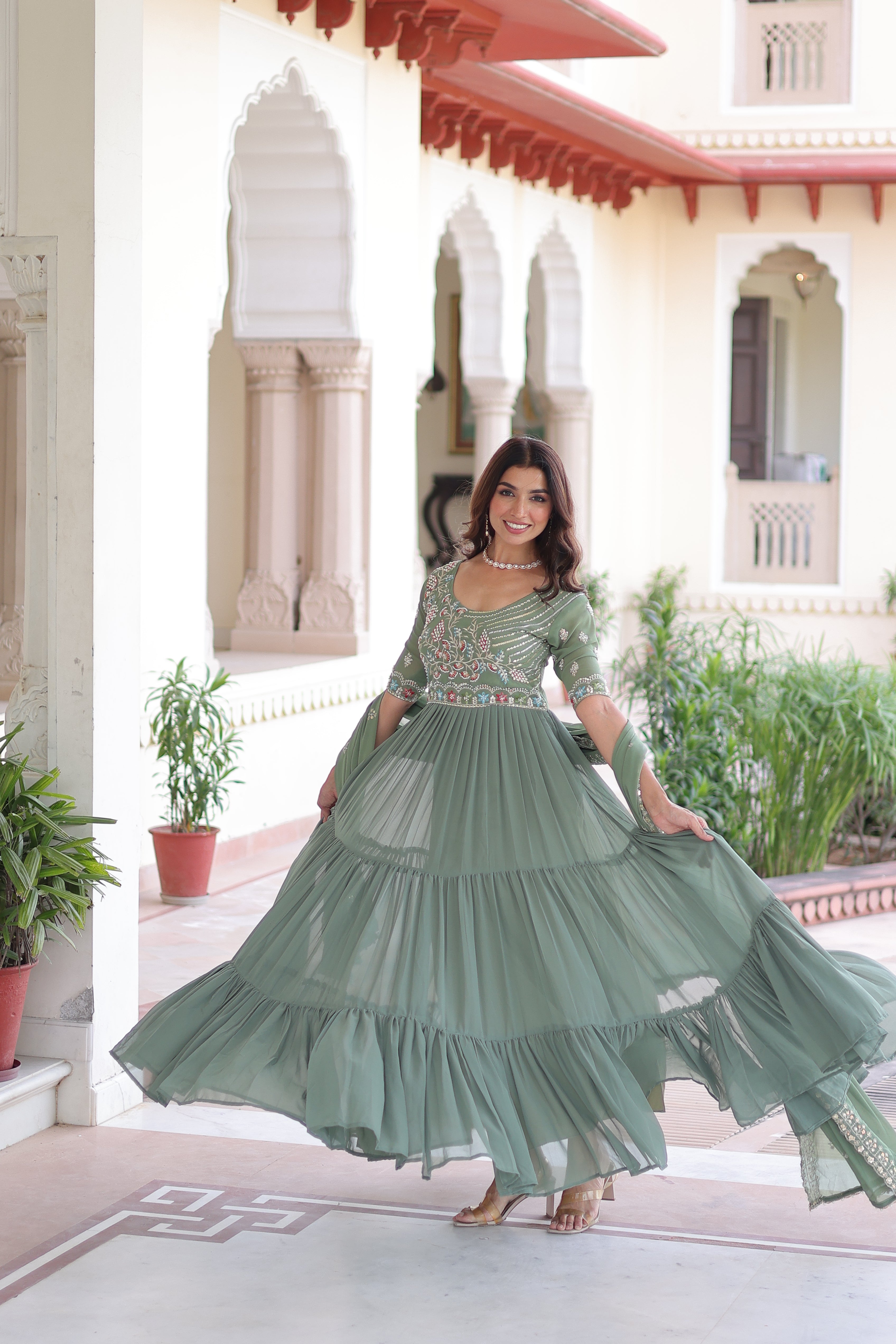 Tosi pista green faux blooming gown with sequins embroidered work and dupatta