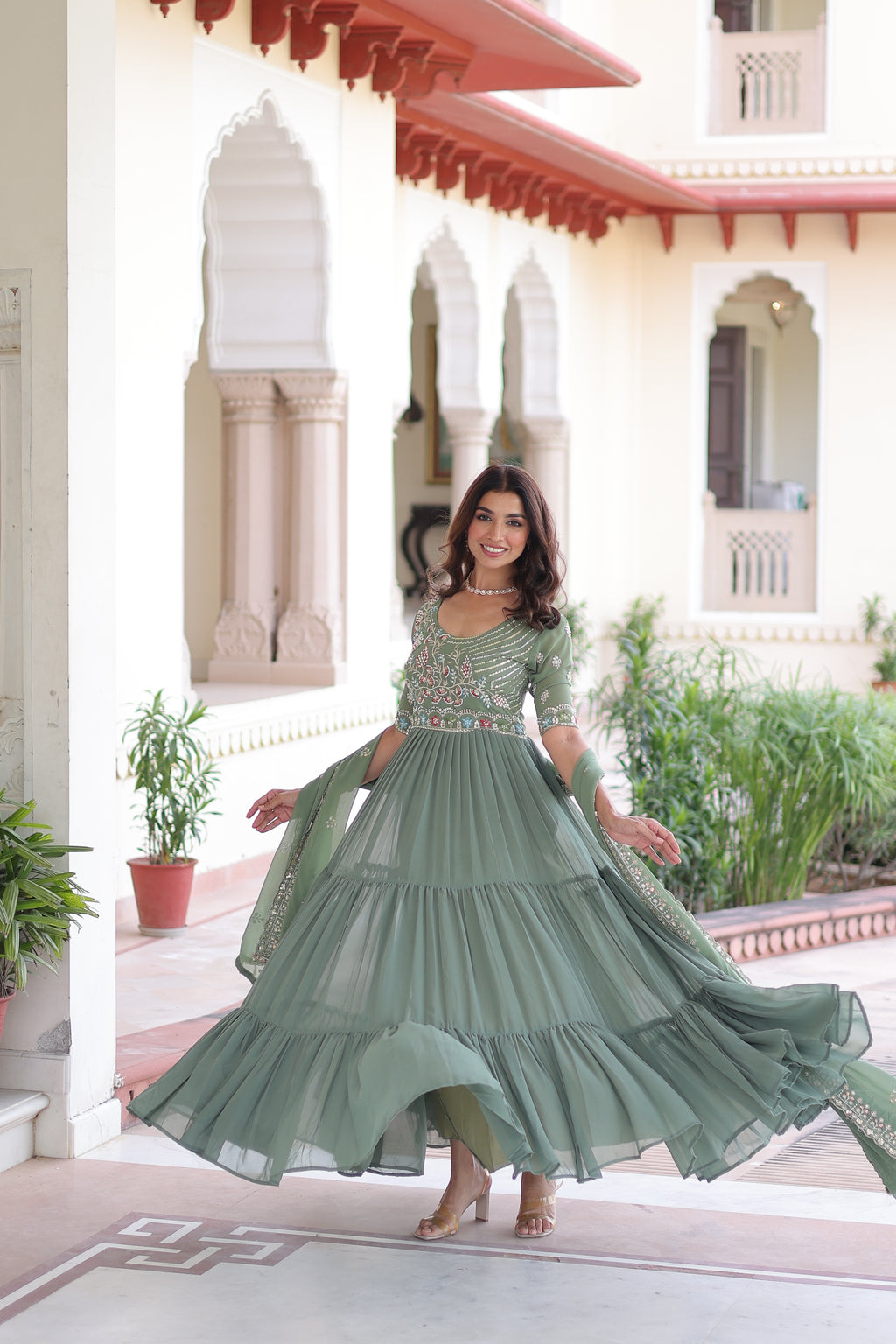 Tosi pista green faux blooming gown with sequins embroidered work and dupatta