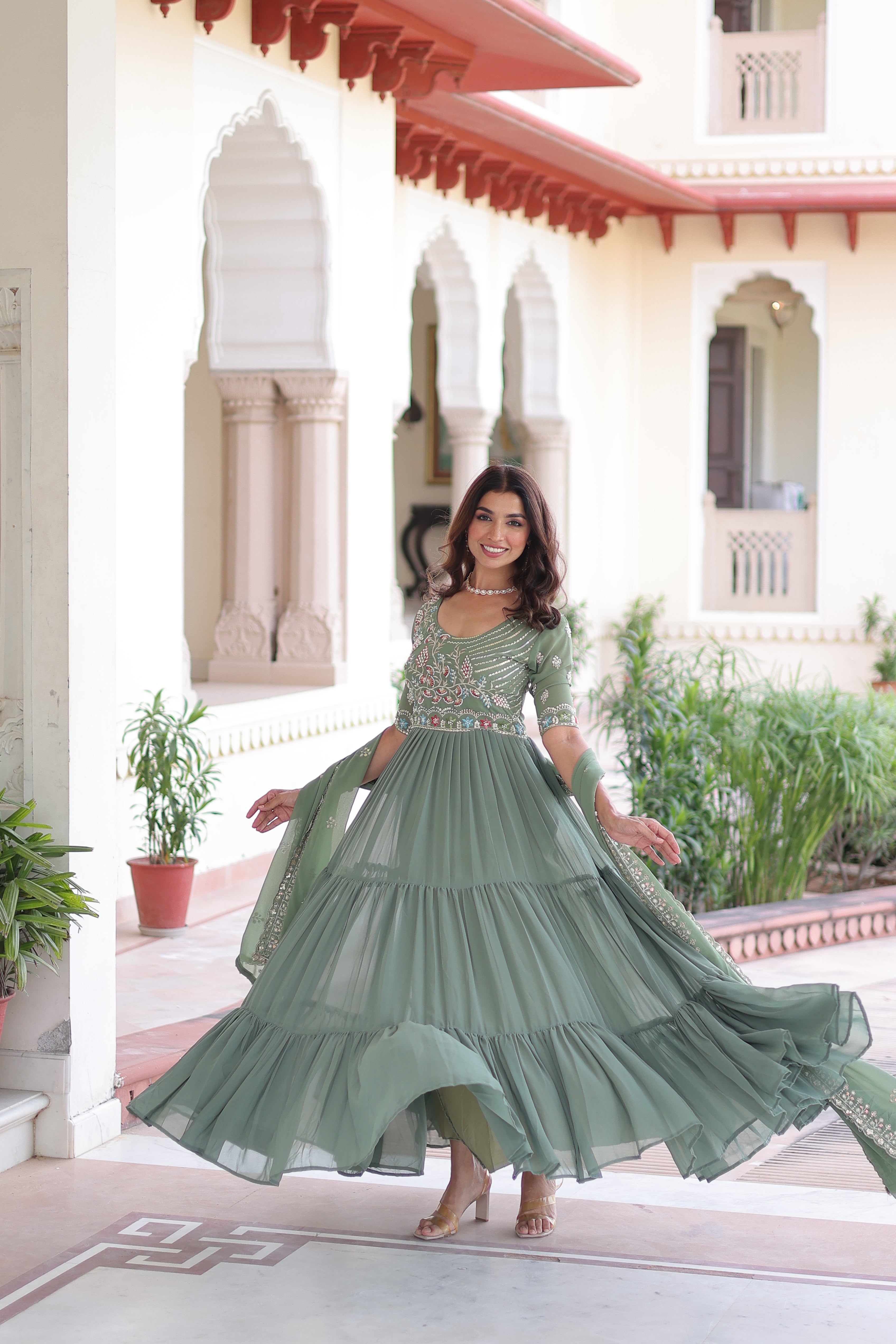 Tosi pista green faux blooming gown with sequins embroidered work and dupatta