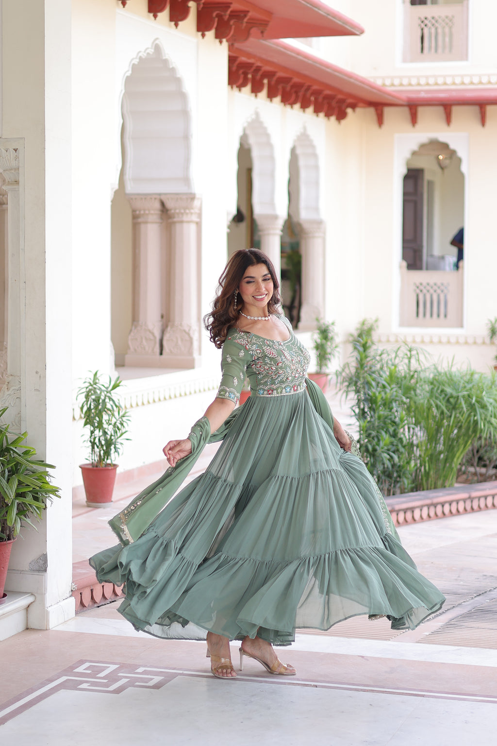 Tosi pista green faux blooming gown with sequins embroidered work and dupatta