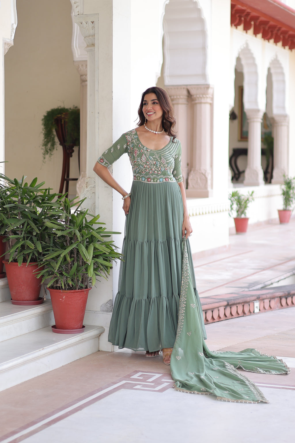 Tosi pista green faux blooming gown with sequins embroidered work and dupatta