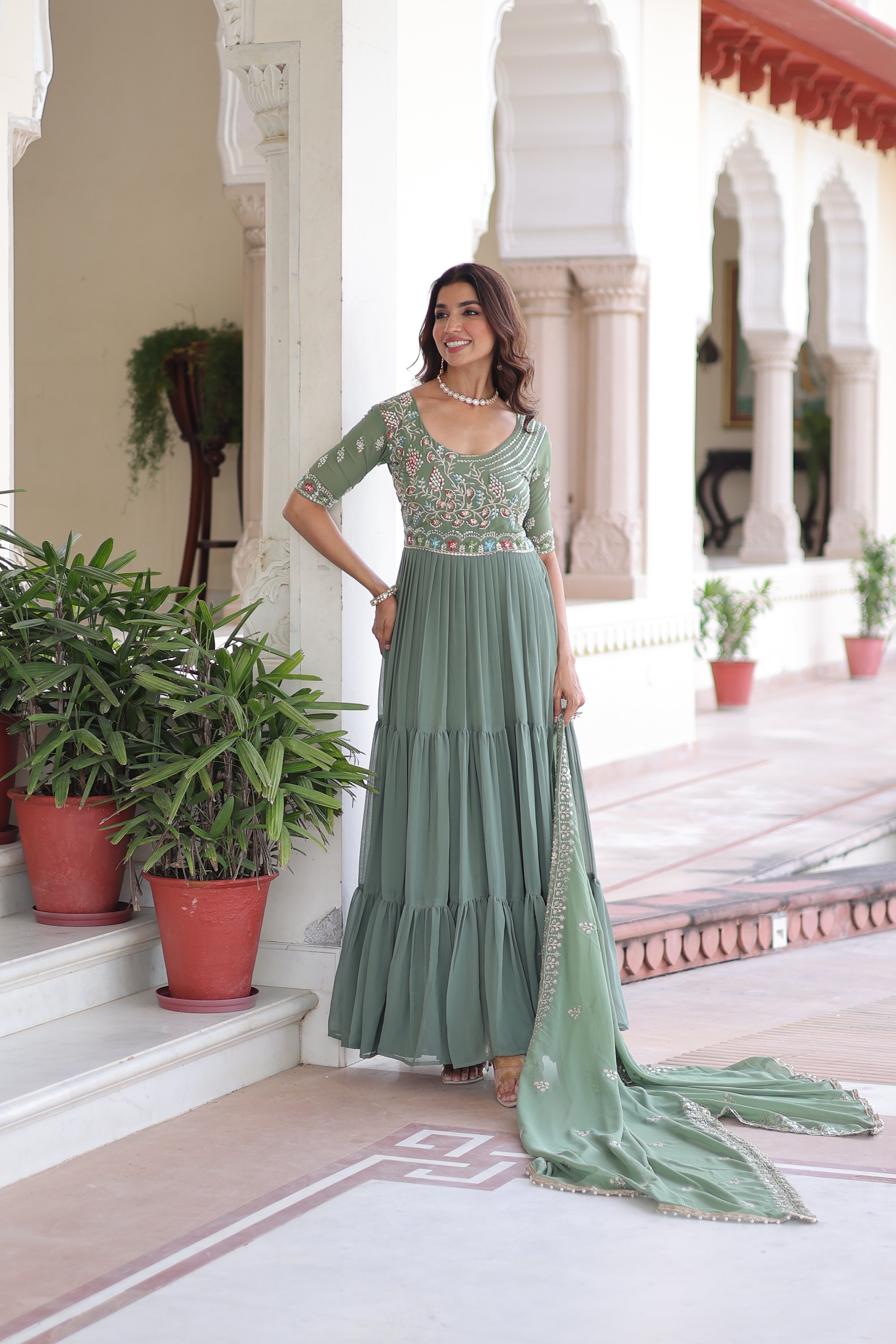 Tosi pista green faux blooming gown with sequins embroidered work and dupatta