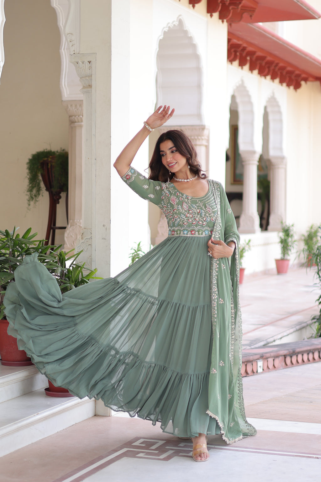 Tosi pista green faux blooming gown with sequins embroidered work and dupatta