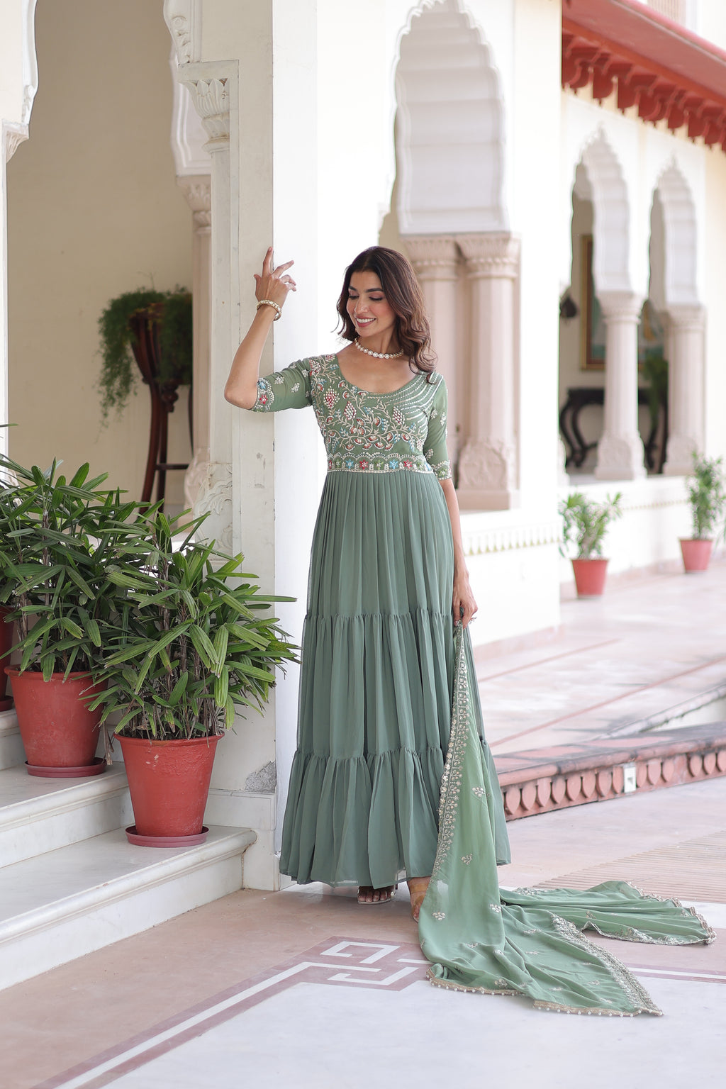 Tosi pista green faux blooming gown with sequins embroidered work and dupatta