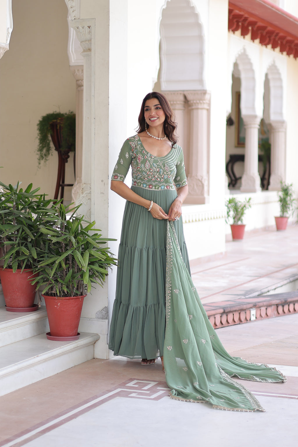 Tosi pista green faux blooming gown with sequins embroidered work and dupatta