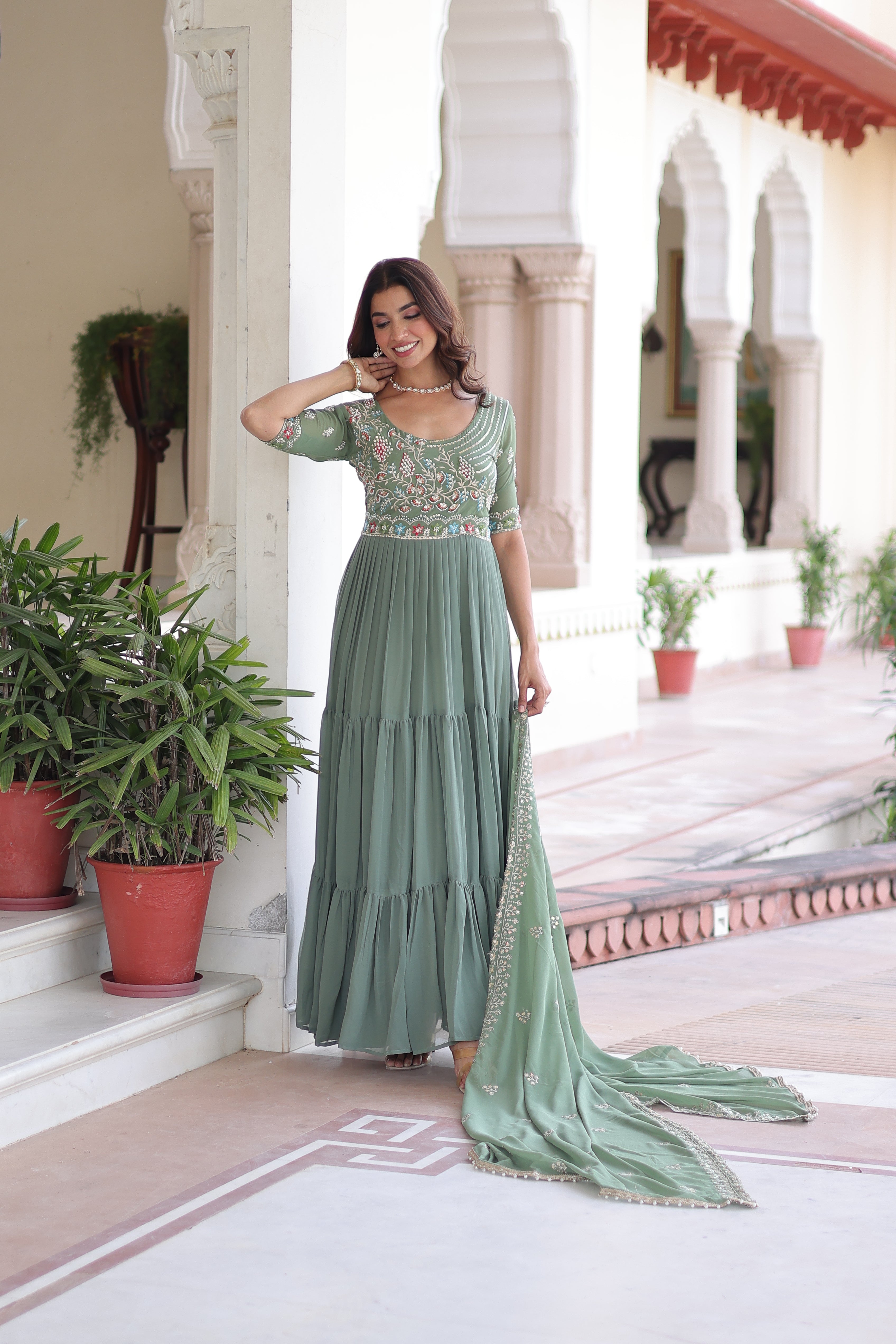 Tosi pista green faux blooming gown with sequins embroidered work and dupatta