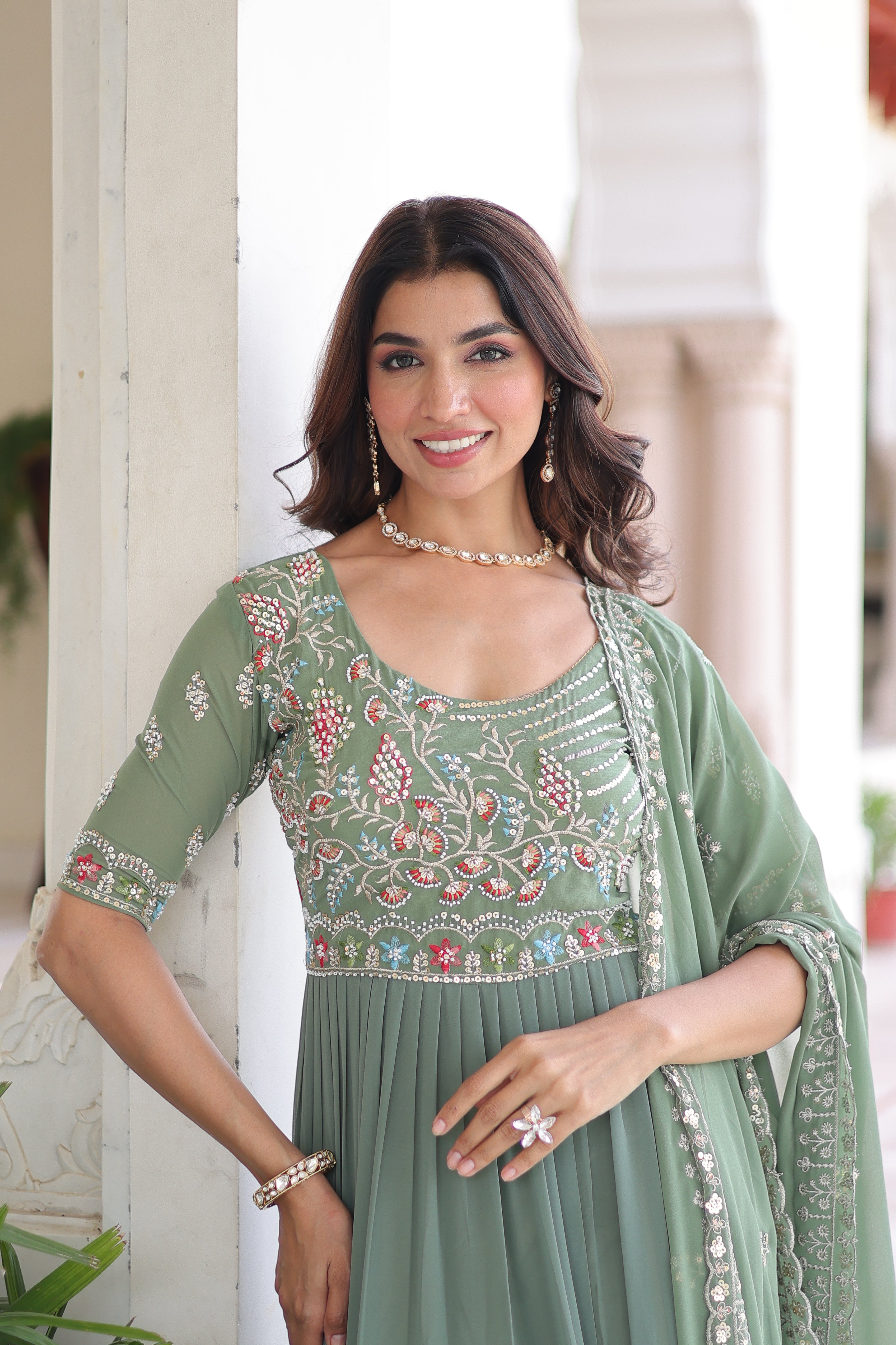 Tosi pista green faux blooming gown with sequins embroidered work and dupatta