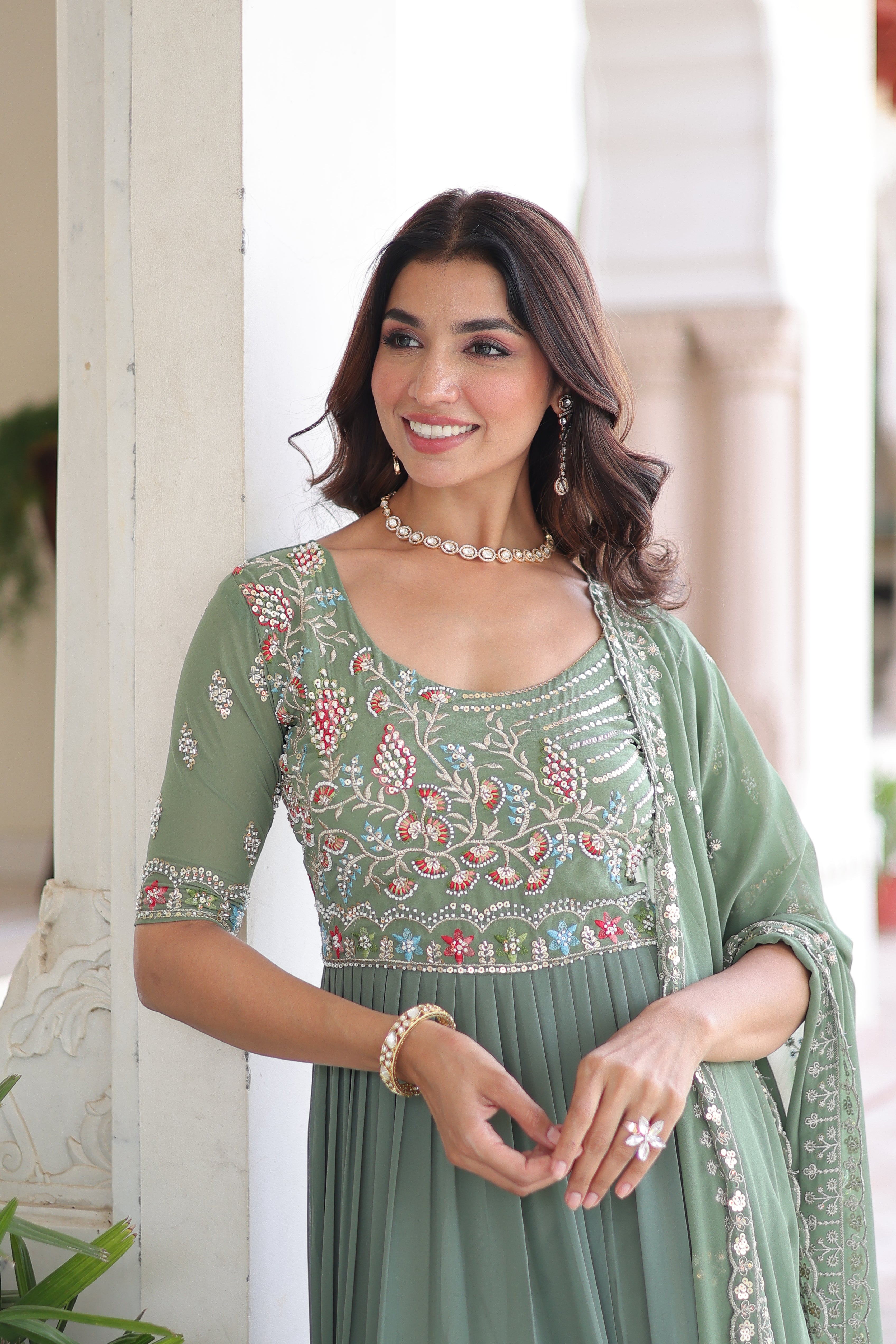 Tosi pista green faux blooming gown with sequins embroidered work and dupatta