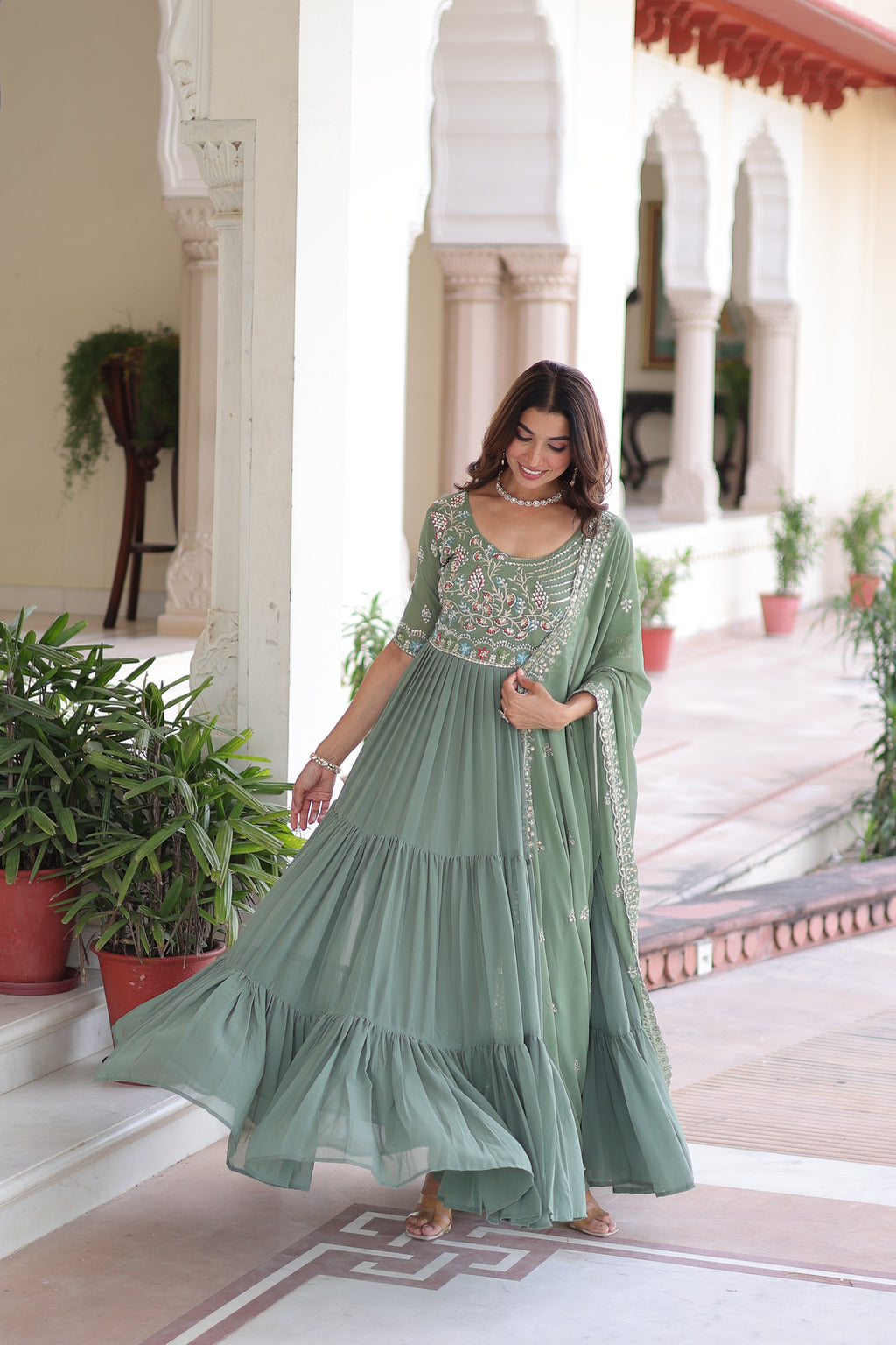 Tosi pista green faux blooming gown with sequins embroidered work and dupatta