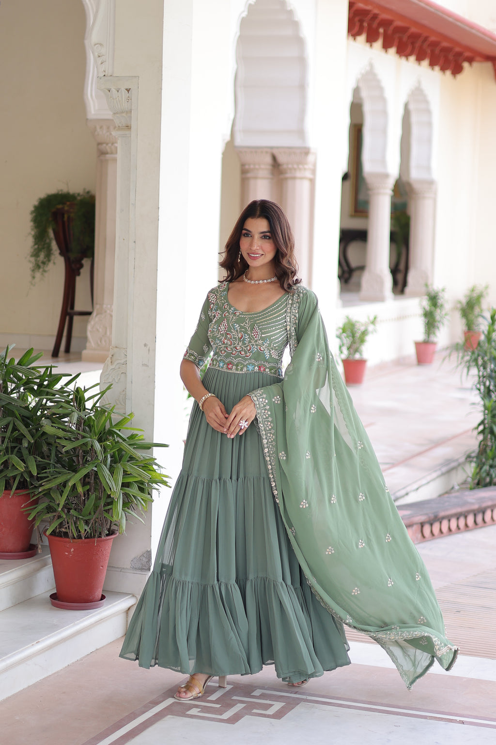 Tosi pista green faux blooming gown with sequins embroidered work and dupatta