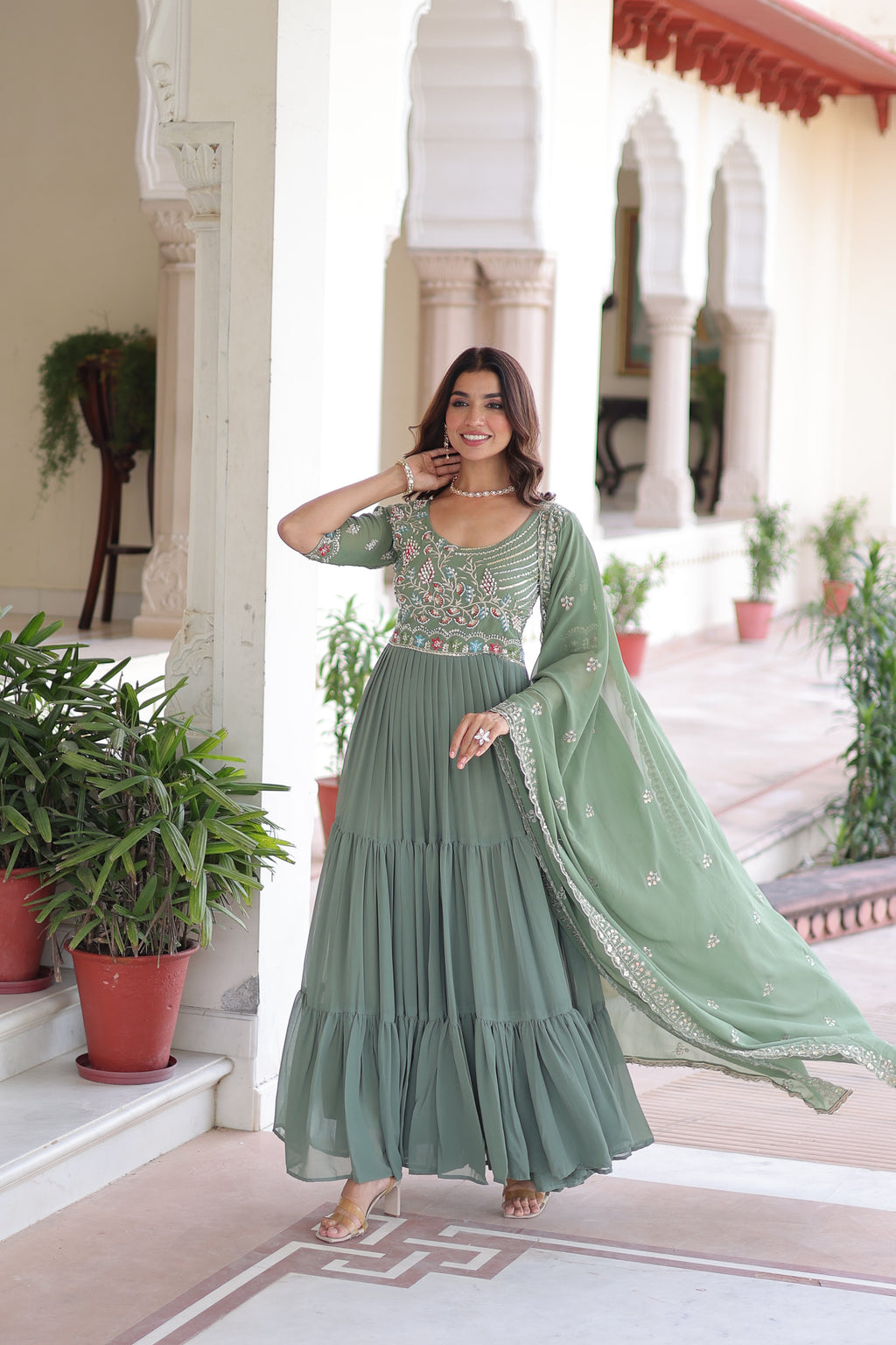 Tosi pista green faux blooming gown with sequins embroidered work and dupatta