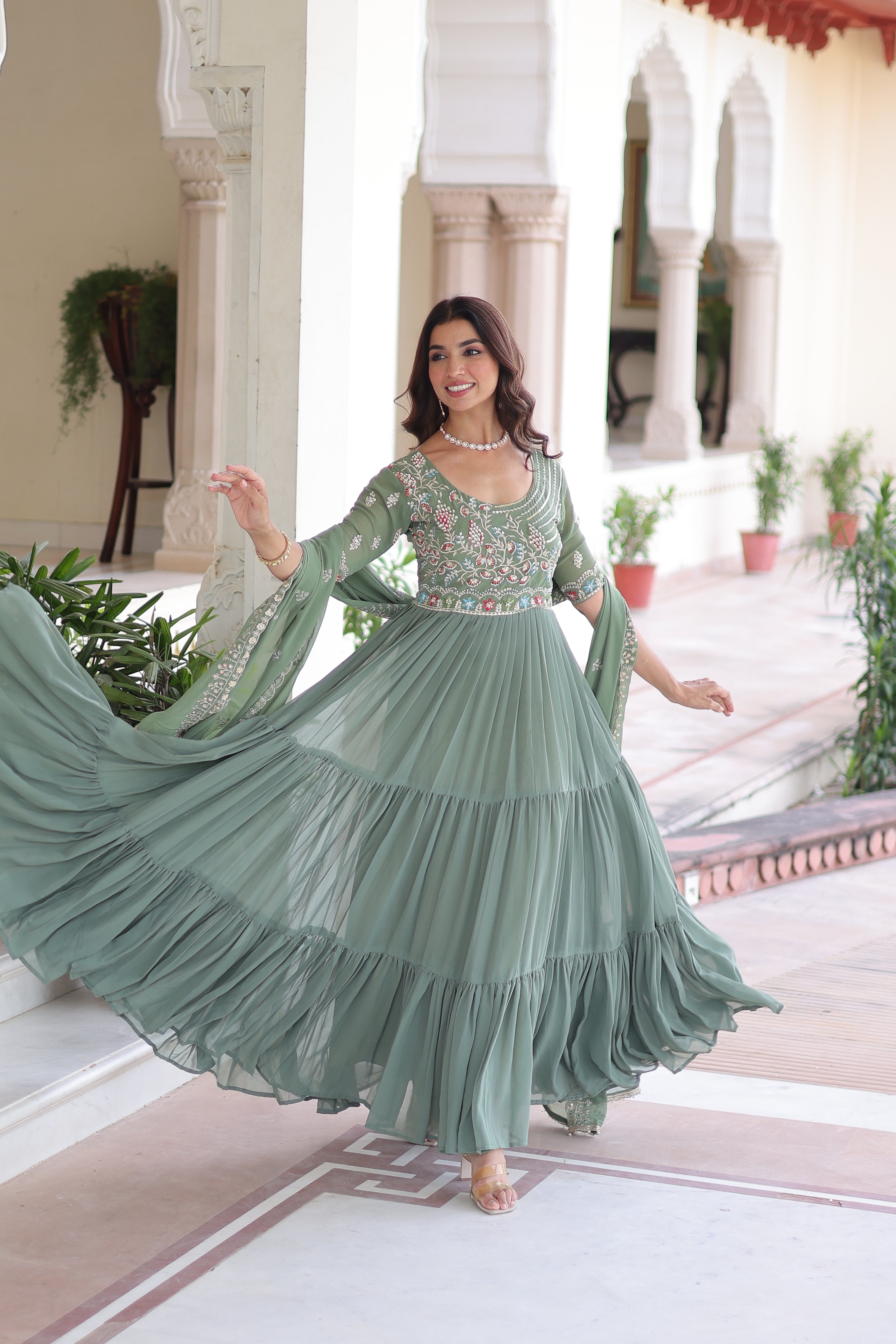 Tosi pista green faux blooming gown with sequins embroidered work and dupatta