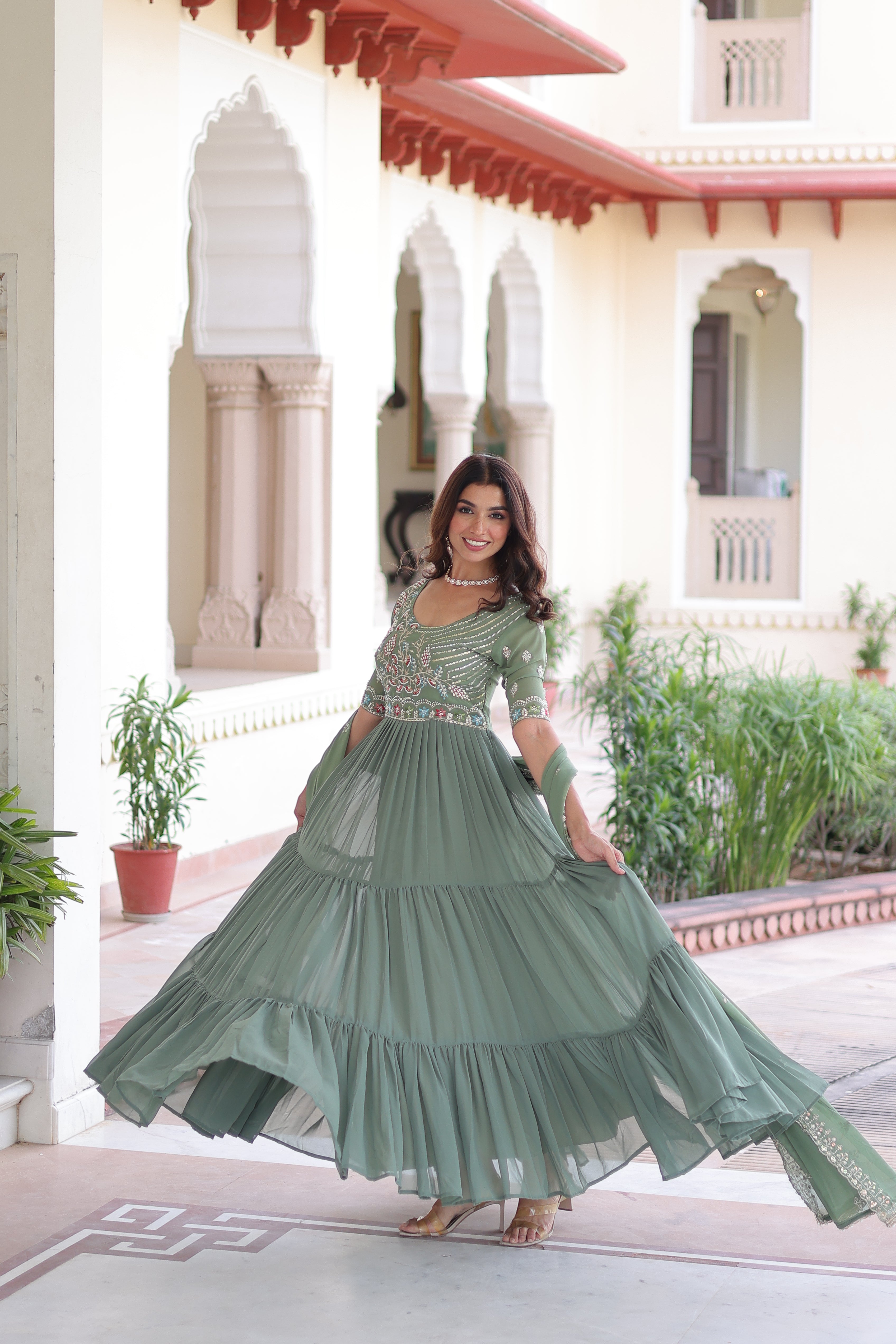 Tosi pista green faux blooming gown with sequins embroidered work and dupatta