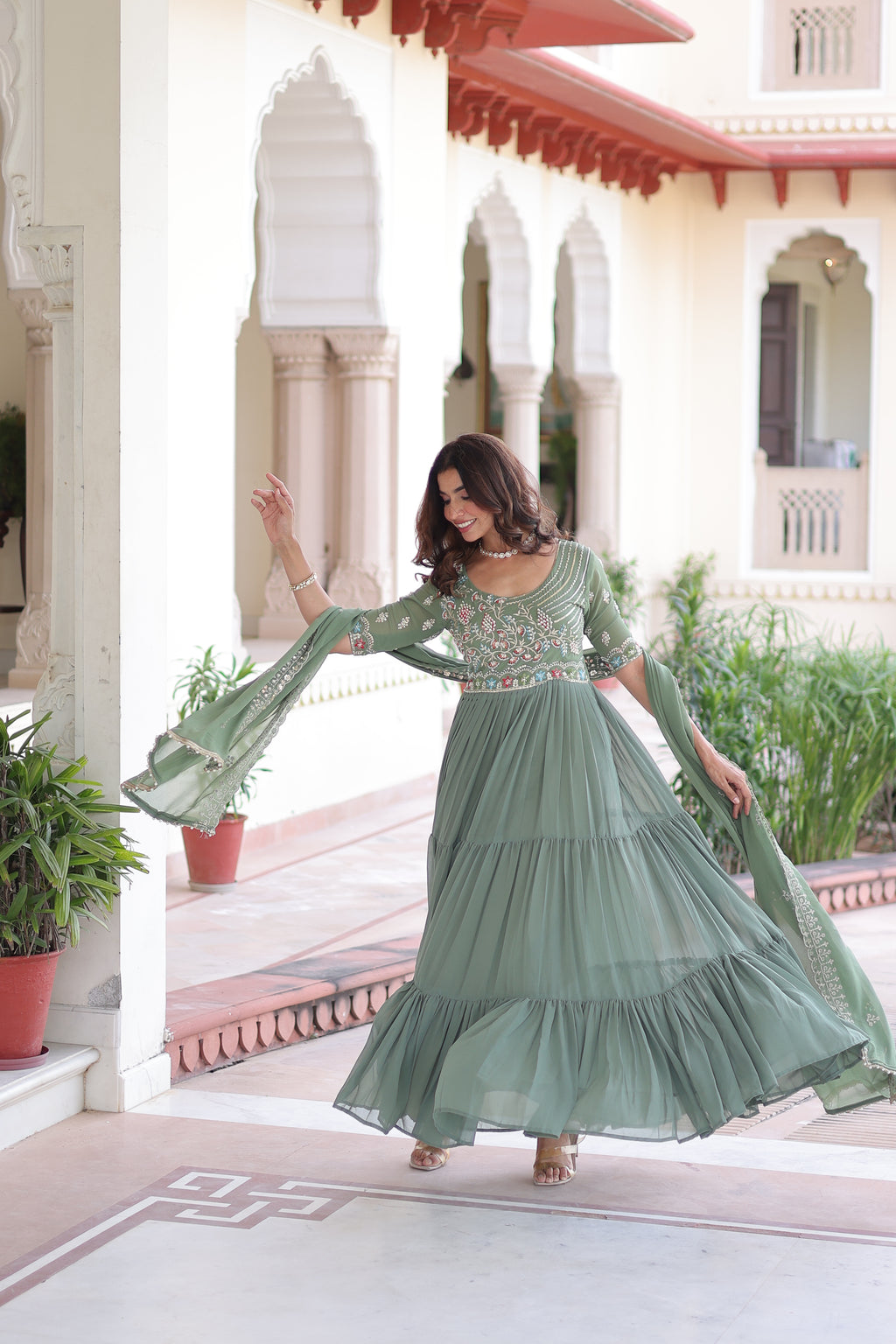 Tosi pista green faux blooming gown with sequins embroidered work and dupatta