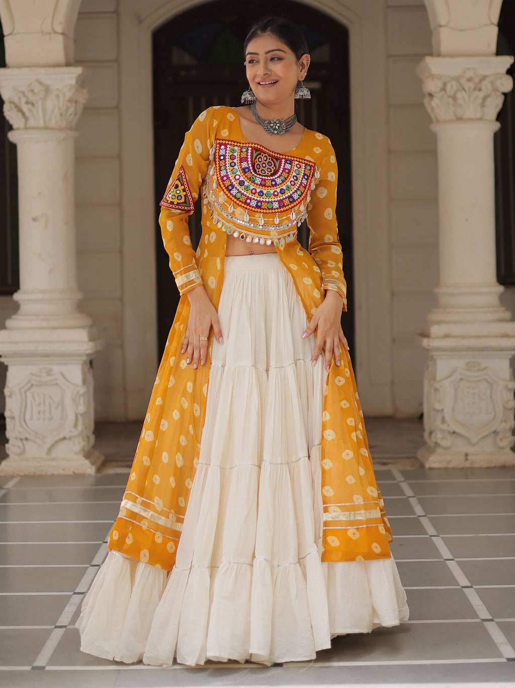 Yellow bandhani print kurti with kutchi patchwork kora cotton lehenga