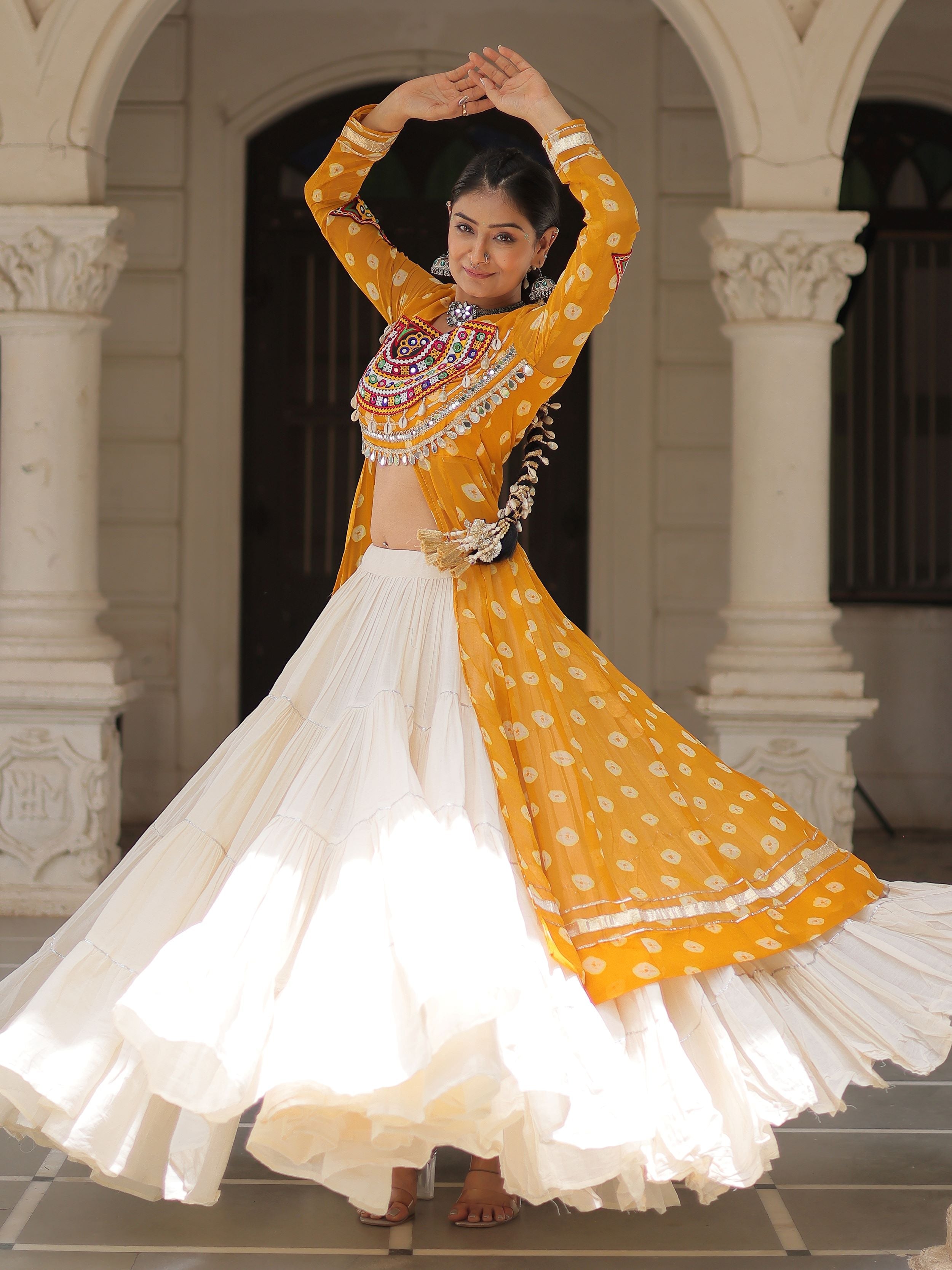 Yellow bandhani print kurti with kutchi patchwork kora cotton lehenga