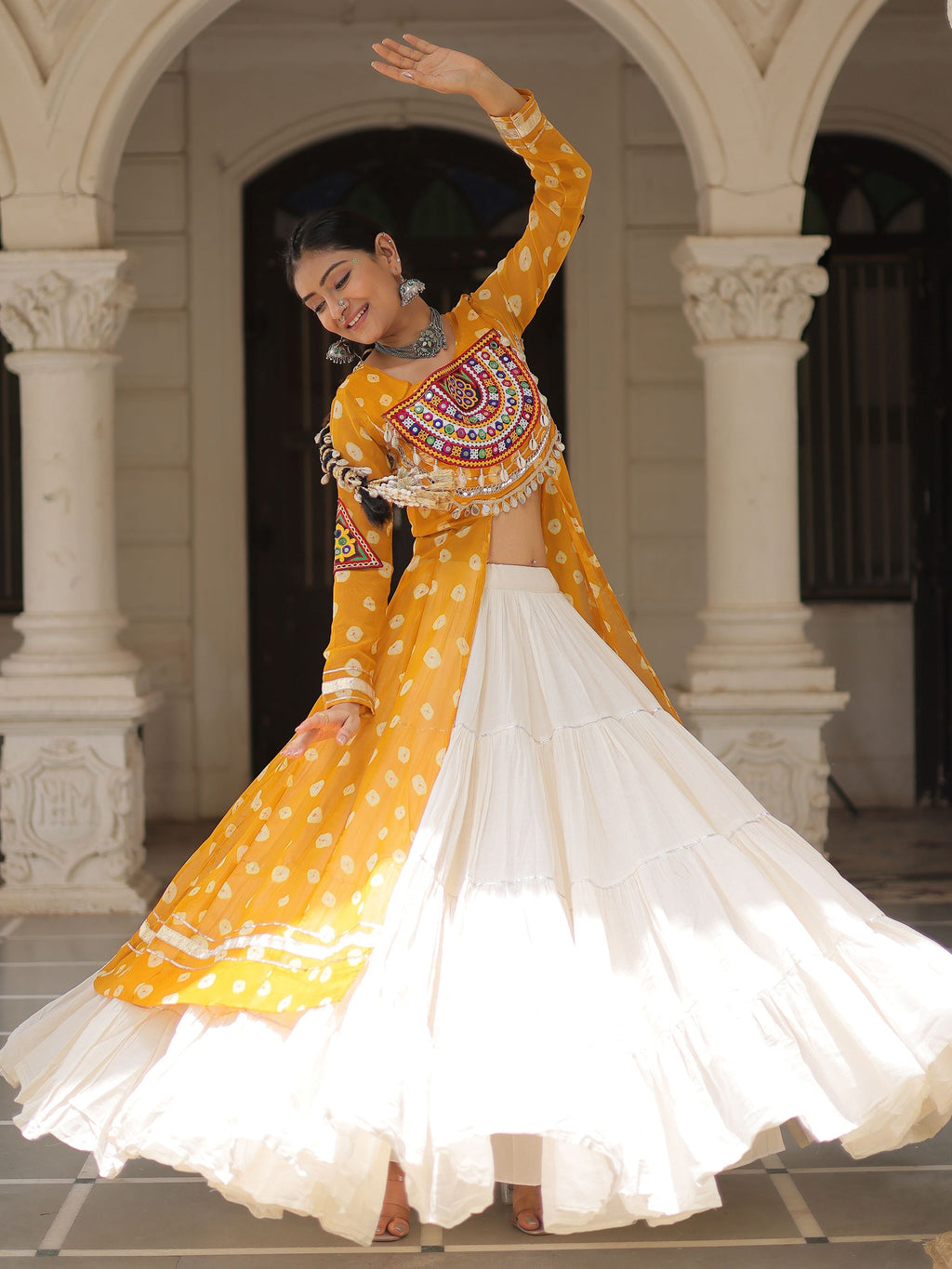 Yellow bandhani print kurti with kutchi patchwork kora cotton lehenga