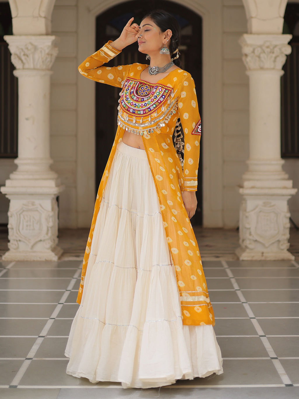 Yellow bandhani print kurti with kutchi patchwork kora cotton lehenga